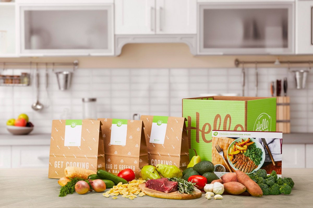 Hello Fresh meals are displayed on a kitchen counter. 