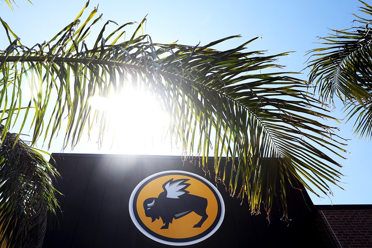 The sign of Buffalo Wild Wings is photographed. 