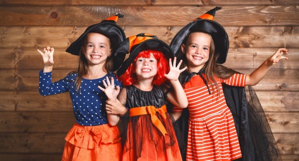 Little girls in witch fancy dress