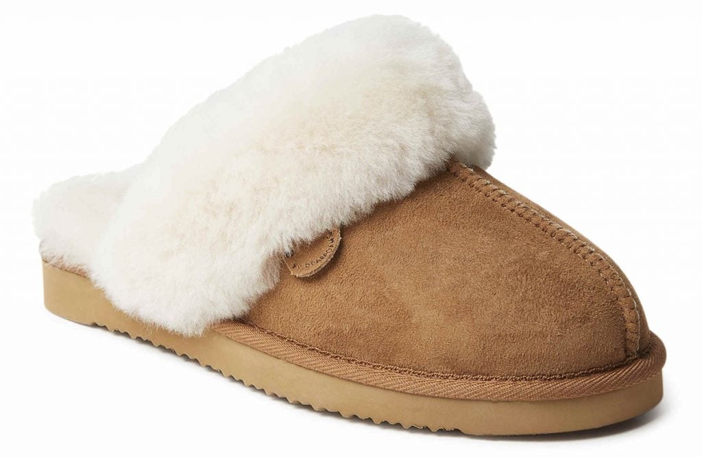A beige fuzzy slipper from Dearfoams. 