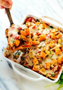 This is a photo of roasted vegetable enchilada casserole dish.