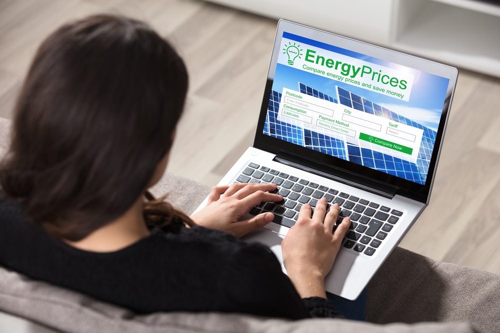 Woman looking at an energy price comparison website